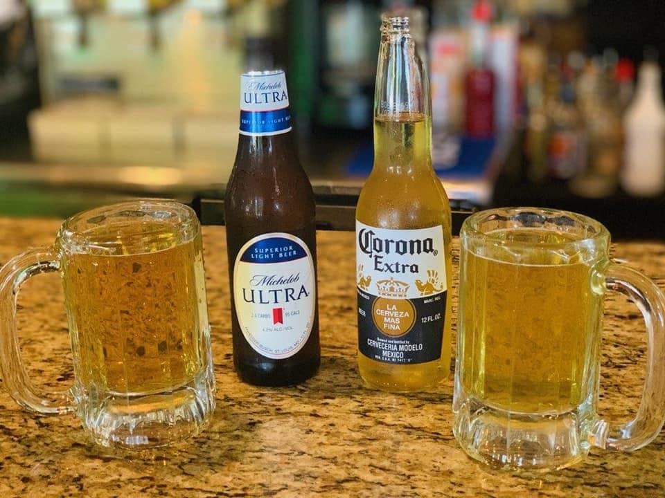 Cold beer poured at the bar.