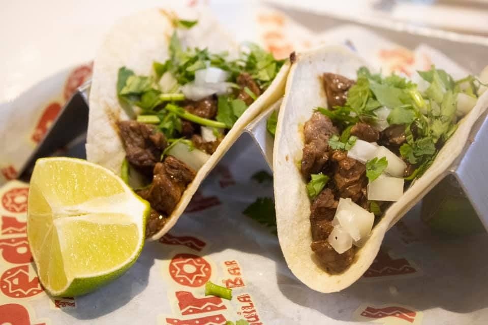 Street tacos, dressed and ready to eat.